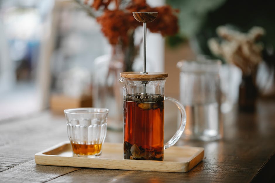 Artisanal tea preparation showcasing traditional brewing methods